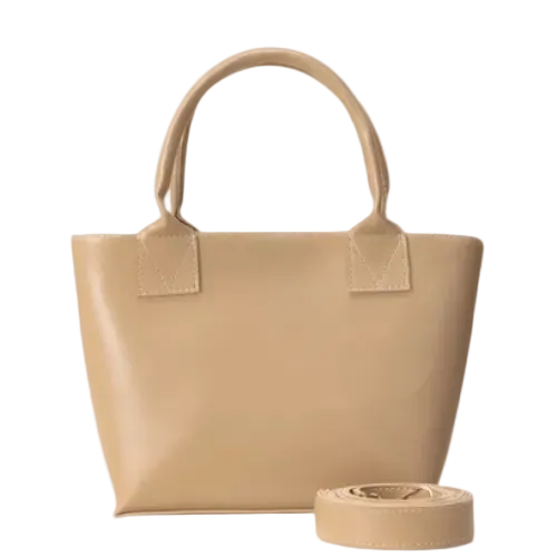 Beige handbag with matching strap on a white background